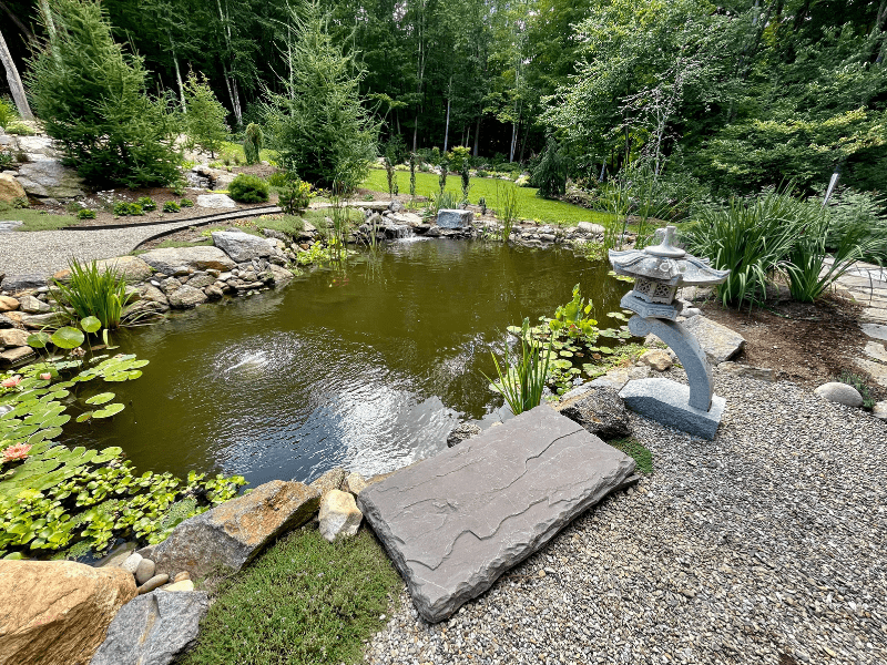 The koi pond and surrounding statues.