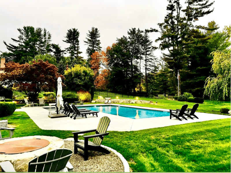Poolscaping at its best with color, texture and outdoor lighting